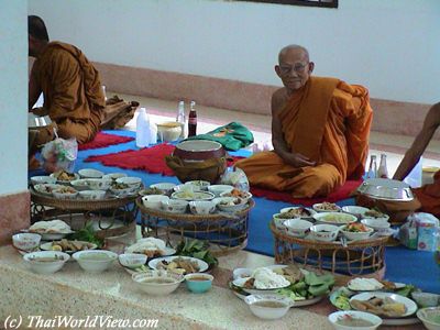 Monks having meal