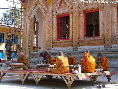 Monks eating meal