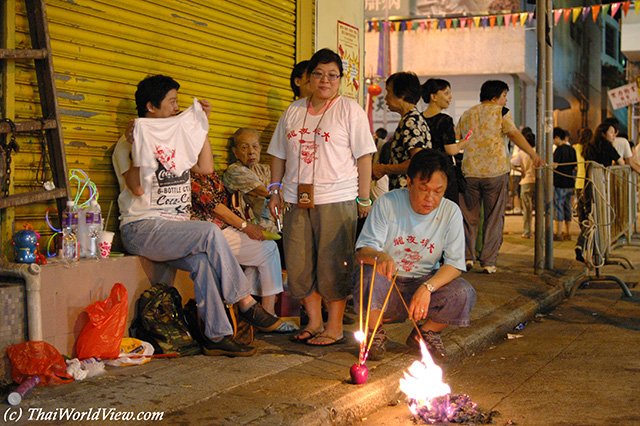 Burning paper - CauseWay bay district