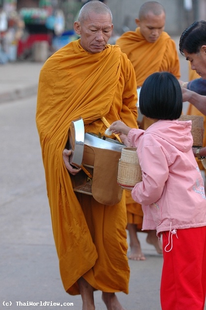 Giving alms - Nongkhai province