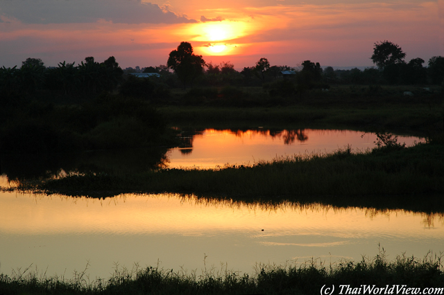 Sunset over pond - ThaBo district - Nongkhai province