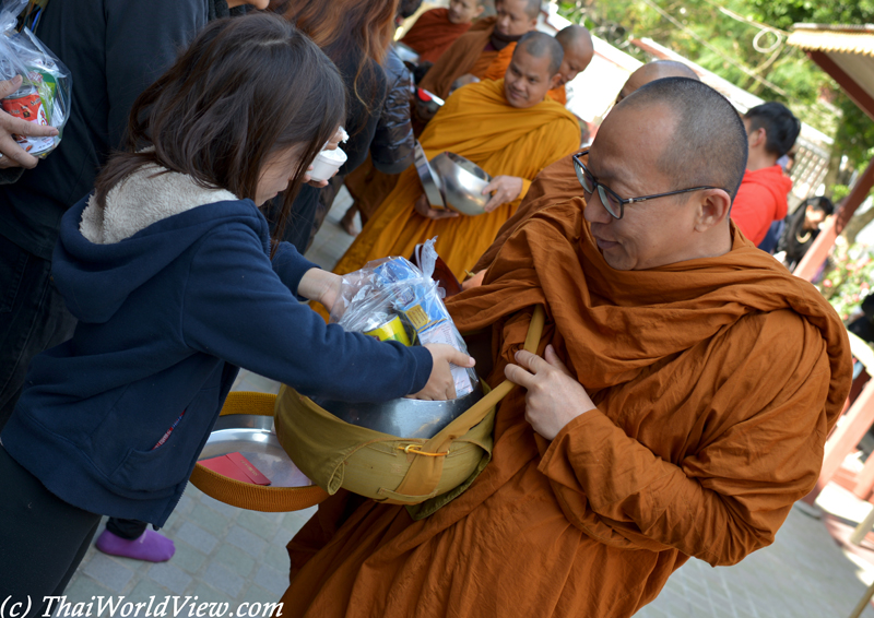 Alms giving - Yuen Long