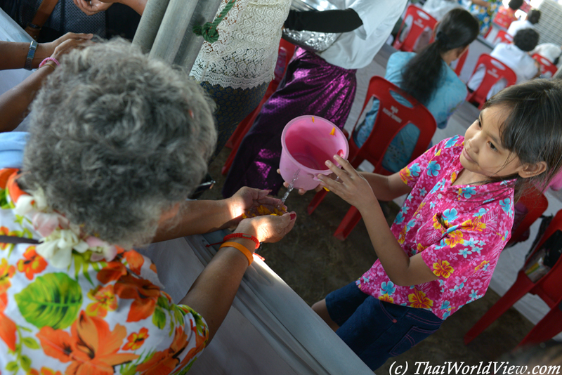 Pouring water - Nakhon Pathom